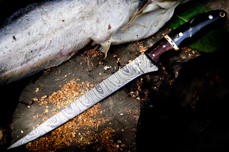 Handmade Damascus fillet knife with buffalo horn rosewood handle brass spacers and leather sheath