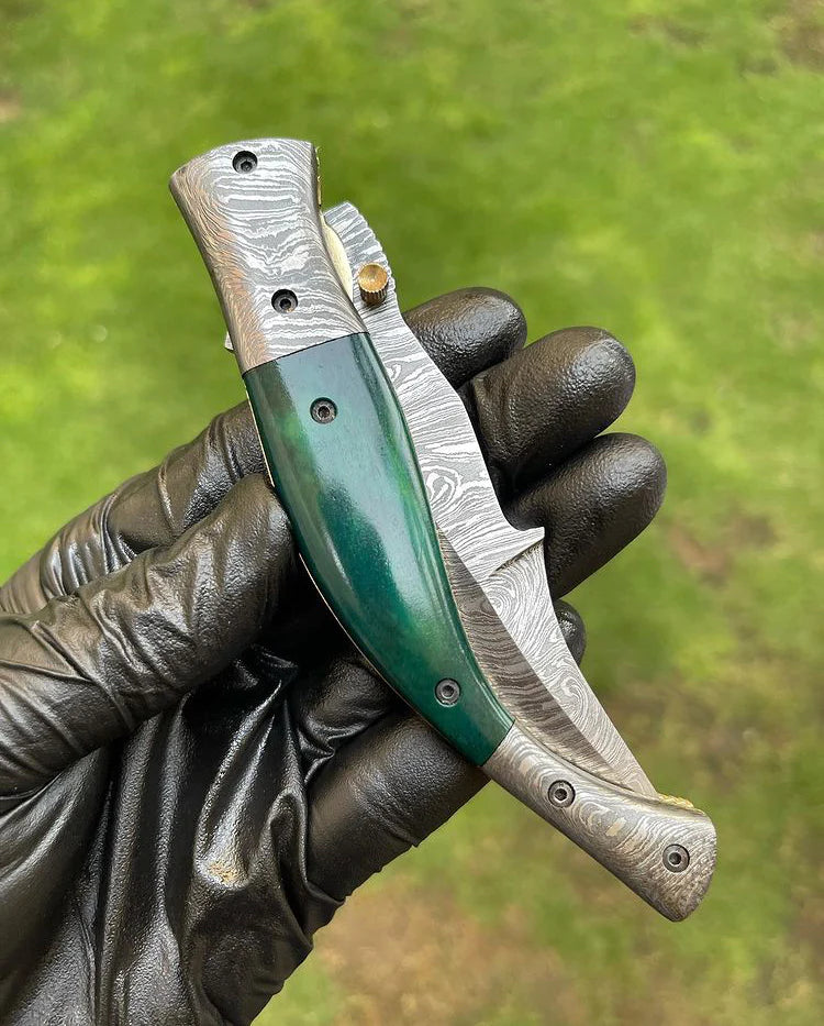Handmade Damascus pocket knife with 3-inch blade, color bone handle, and brass bolster, ideal gift item