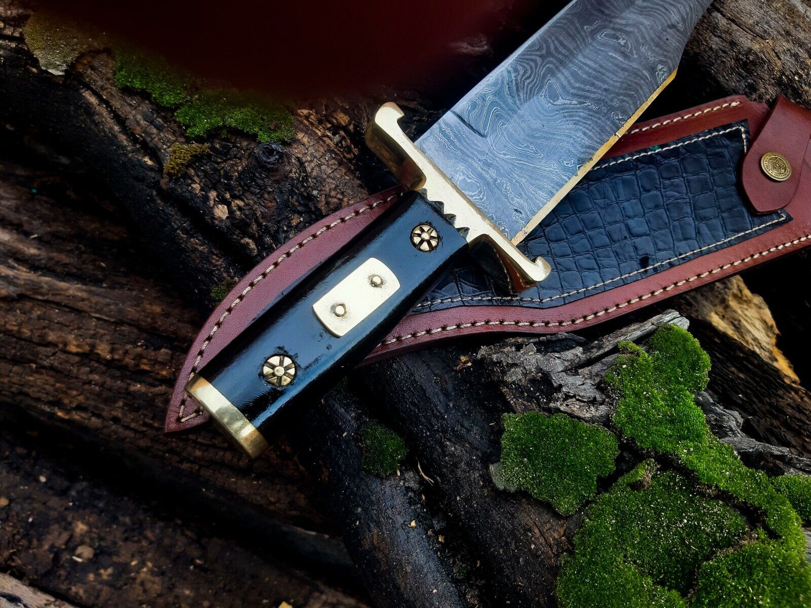 "Handmade Damascus steel bowie knife with brass guard and buffalo horn handle"