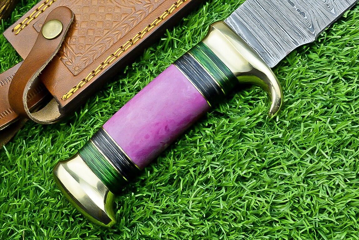 "Handmade Damascus steel bowie knife with leather sheath and pakkawood handle"