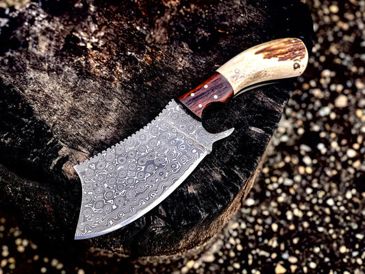 Handmade Damascus steel cleaver knife with antler horn handle and rosewood bolster, featuring a leather sheath