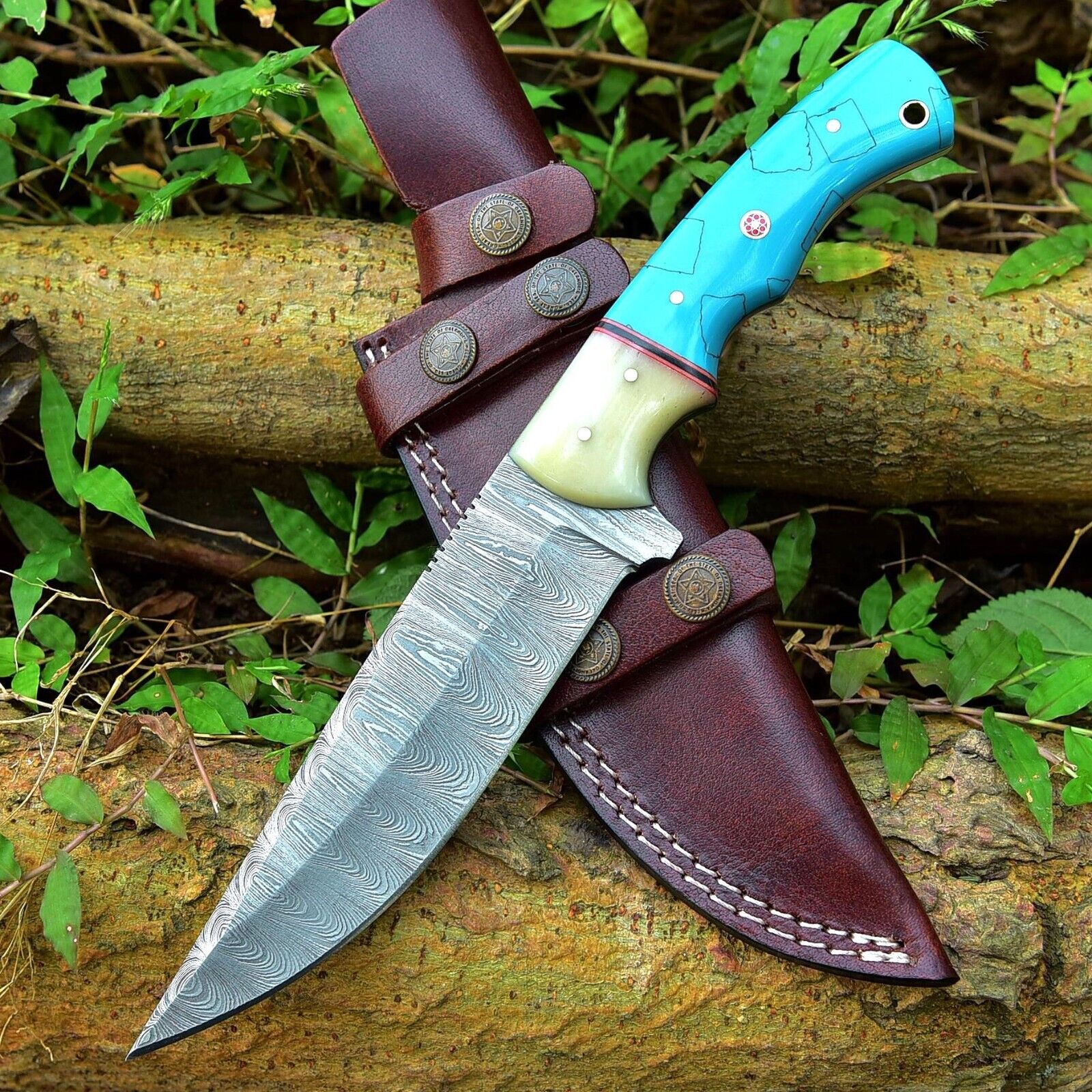 "Handmade Damascus steel hunting knife with ergonomic resin handle and a protective leather sheath for outdoor use