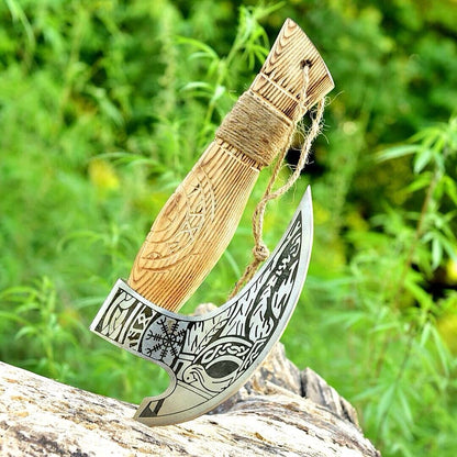Handmade ax pizza cutter featuring intricate engravings and protective leather sheath