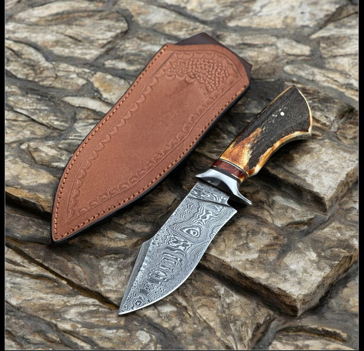 "Premium Damascus Steel Hunting Knife with Stag Horn Handle and Leather Belt Loop Case – Perfect for Outdoor Adventures"

