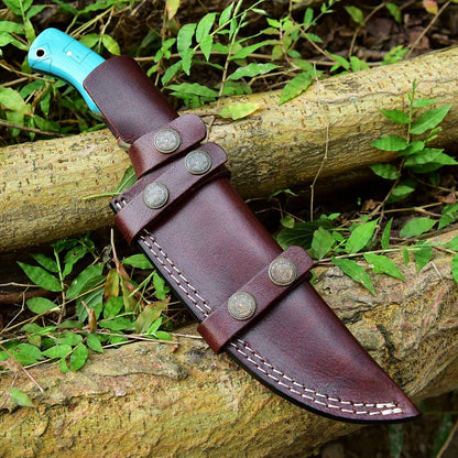 Premium Damascus steel hunting knife with 10-inch blade, resin handle, and a stylish leather sheath for safe storage
