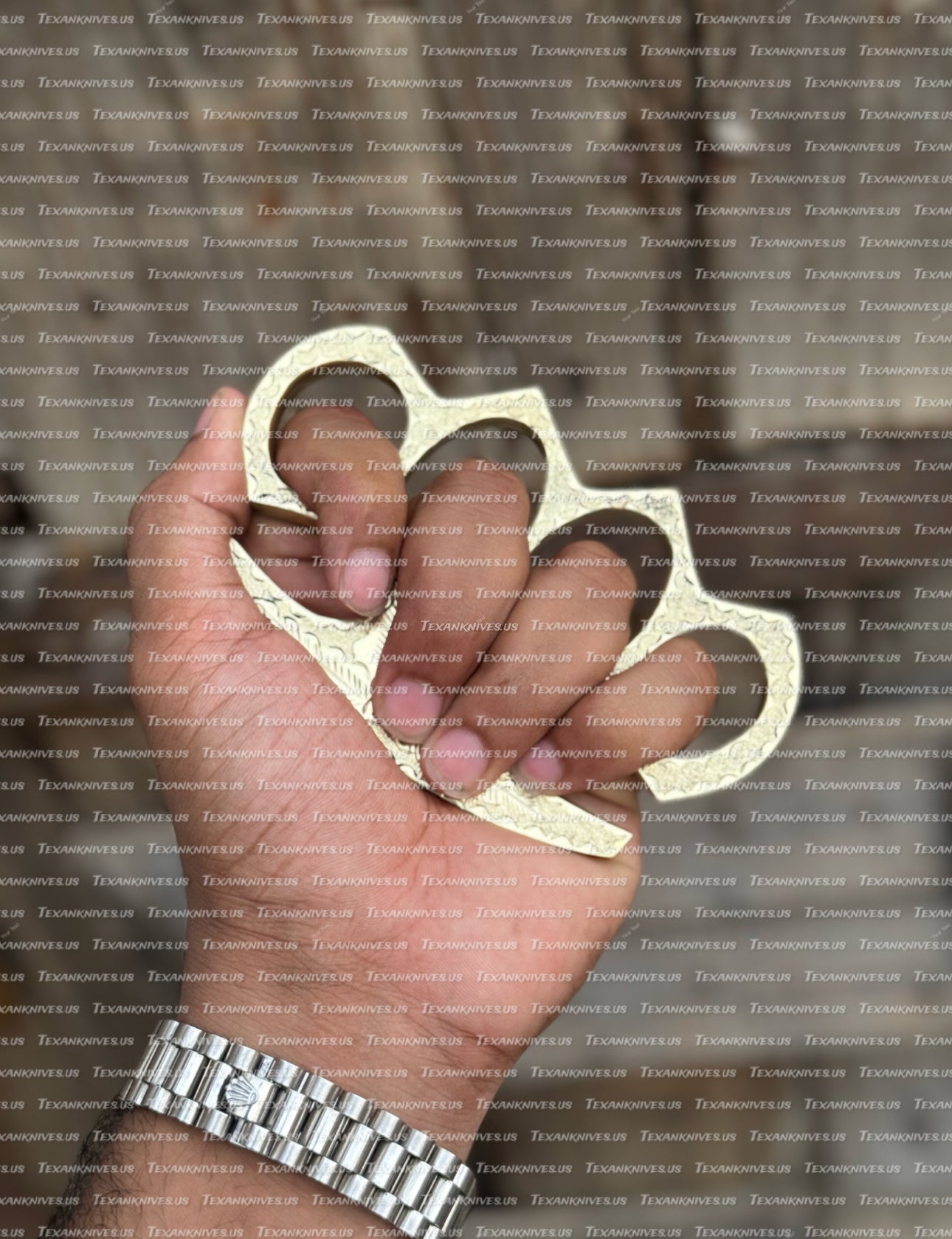 Pure brass knuckles with intricate hand-engraved design
