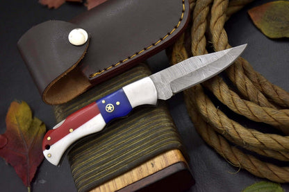 "Texas flag pocket knife – 3-inch Damascus steel blade with collectible leather case"