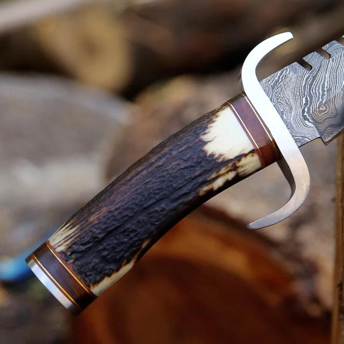 Western Bowie Knife with Damascus Steel Blade and Leather Sheath.