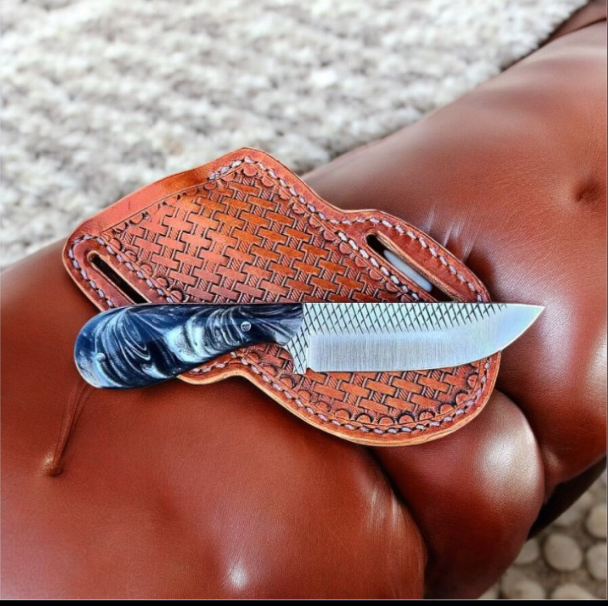 "Western fixed blade knife with rasp tool steel blade and resin handle"

